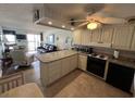 Well-equipped kitchen with granite countertops and modern appliances at 201 76Th Ave. N # C3, Myrtle Beach, SC 29572