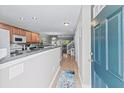 Bright entryway with view into kitchen and living areas at 647 Riverward Dr. # 647, Myrtle Beach, SC 29588