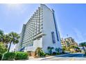 High-rise oceanfront hotel, Blue Water Resort, with unique architectural design at 2001 S Ocean Blvd. # 814, Myrtle Beach, SC 29577