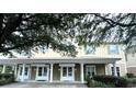 Two-story building with inviting front porch and landscaping at 4916 N N Market St. # 202, North Myrtle Beach, SC 29582