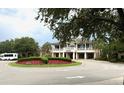 Elegant community center with landscaping and circular driveway at 4916 N N Market St. # 202, North Myrtle Beach, SC 29582