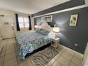 King-size bed, coastal bedding, and dark-blue accent wall at 2000 N Ocean Blvd. # 1807, Myrtle Beach, SC 29577