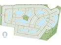 Aerial view of a residential community with houses surrounding a lake at 546 Cypress Preserve Circle, Longs, SC 29568