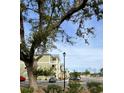 Apartment building exterior showcasing landscaping and parking area at 35 Delray Dr. # 2-C, Murrells Inlet, SC 29576