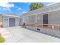 Gray exterior house with a covered porch and attached garage at 6001-5240 S Kings Hwy., Myrtle Beach, SC 29575