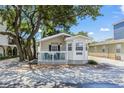 Quaint beach cottage with a charming front porch at 6001 - 1193A S Kings Hwy., Myrtle Beach, SC 29575