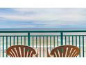 Stunning ocean view from a balcony with two chairs at 2207 S Ocean Blvd. # 1516, Myrtle Beach, SC 29577