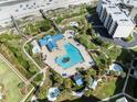 Aerial view of condo complex pool, beach access, and landscaping at 669 Retreat Beach Circle # C2G, Pawleys Island, SC 29585