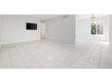 Spacious living room with tile floors and plenty of natural light at 800 9Th Ave. S # T-4, North Myrtle Beach, SC 29582