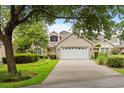 Two story home with attached garage and manicured landscaping at 723 Antigua Dr., Myrtle Beach, SC 29572