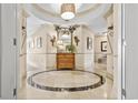 Elegant entryway with circular floor and decorative console table at 122 Vista Del Mar Ln. # 2-302, Myrtle Beach, SC 29572