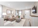 Cozy living room featuring a neutral color palette and ample natural light at 8926 Brynlee Rd. # 4A, Longs, SC 29568