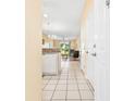 View of condo entryway, kitchen, and living room at 472 River Oaks Dr. # 65C, Myrtle Beach, SC 29579