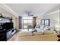 Spacious living room with comfortable seating and ocean view at 100 North Beach Blvd. # 306, North Myrtle Beach, SC 29582