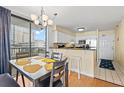 Kitchen and dining area with ocean view at 4719 South Ocean Blvd. # 309, North Myrtle Beach, SC 29582