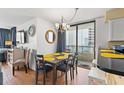 Dining area with table and chairs, ocean view at 4719 South Ocean Blvd. # 309, North Myrtle Beach, SC 29582