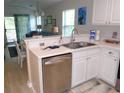 Modern kitchen with stainless steel appliances and white cabinets at 562 Blue Stem Dr. # 54R, Pawleys Island, SC 29585