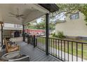 Front porch with rocking chairs and string lights at 6001 - N-45 S Kings Hwy., Myrtle Beach, SC 29575