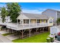 Elevated beach house with large deck and parking underneath at 6001 - 1550 S Kings Hwy., Myrtle Beach, SC 29575