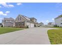 Tan house with driveway and landscaping at 5188 Country Pine Dr., Myrtle Beach, SC 29579