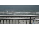 Relaxing ocean view from a balcony, showing the beach below at 201 S Ocean Blvd. # 1109, Myrtle Beach, SC 29577
