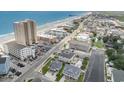 Aerial view of the property and beach at 919A N Waccamaw Dr., Murrells Inlet, SC 29576