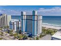 Oceanfront high-rise building with surrounding buildings and parking at 2300 N Ocean Blvd. # 238, Myrtle Beach, SC 29577