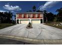 Two-unit building with attached garages and landscaping at 108 Hallandale Lane, Murrells Inlet, SC 29576
