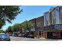 Bustling downtown street with shops and a movie theater at Tbb Shady Grove Rd., Conway, SC 29527