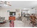 Open living room with comfortable seating and kitchen views at 6001-C21 S Kings Hwy., Myrtle Beach, SC 29575