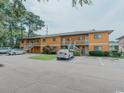 Two-story building with multiple units and parking at 1301 Pridgen Rd. # 105, Myrtle Beach, SC 29577