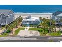 Oceanfront home with private driveway and ocean views at 1919 South Waccamaw Dr., Garden City Beach, SC 29576