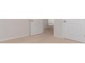 Bright bedroom with neutral carpeting and double door closet at 170 Calm Dr., Little River, SC 29566
