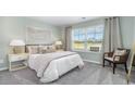 Bedroom with large window, carpeted floor, and neutral decor at 301 Acosta Circle, Conway, SC 29527