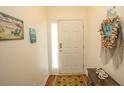 Simple entryway with hardwood floors and beach decor at 4917 Twin Pond Ct. # 102, Myrtle Beach, SC 29579