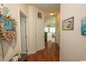 Bright entryway with hardwood floors and beach decor at 4917 Twin Pond Ct. # 102, Myrtle Beach, SC 29579