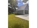 Gray house exterior with metal roof and attached garage at 410 40Th Ave. N, Myrtle Beach, SC 29577