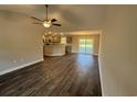 Spacious living room with hardwood floors and kitchen view at Tbd2 Privetts Rd., Conway, SC 29526