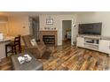 Living room featuring a fireplace and hardwood floors at 1206 Benna Dr. # 4-F, Myrtle Beach, SC 29577