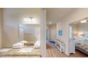 Well-appointed bathroom with granite countertop, updated vanity, and shower at 144 Puffin Dr. # 2-E, Pawleys Island, SC 29585