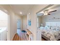 Bright hallway with wood floors and access to bedrooms and living areas at 144 Puffin Dr. # 2-E, Pawleys Island, SC 29585