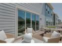 Deck with wicker furniture and glass doors at Tbd Atlantic Breeze St. # Tbd, Myrtle Beach, SC 29572