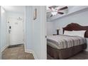 Bedroom with double bed, dresser, and access to hallway at 1321 S Ocean Blvd. # 606, North Myrtle Beach, SC 29582