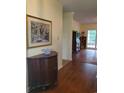 Entryway with hardwood floors and a dark wood cabinet at 5864 Crestwood Dr., Myrtle Beach, SC 29578