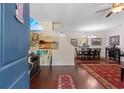 Bright and spacious entryway with hardwood floors, leading to the living and dining areas at 444 Papyrus Circle # 444, Little River, SC 29566