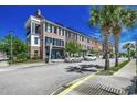 Brick townhomes with parking and sidewalks in a community setting at 3507 Fountain Ln., Myrtle Beach, SC 29577