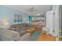 Bright living room with comfortable seating and an open layout to the kitchen at 6001 - 1819 S Kings Hwy., Myrtle Beach, SC 29575