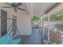Relaxing front porch with a swing and seating area, overlooking the neighborhood at 6001 - 1819 S Kings Hwy., Myrtle Beach, SC 29575