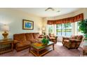 Comfortable living room with bay window and water views at 4508-E Ailsa Ct. # 4508-E, Myrtle Beach, SC 29579