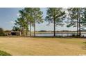 Scenic view of a lake or pond with trees at 4508-E Ailsa Ct. # 4508-E, Myrtle Beach, SC 29579